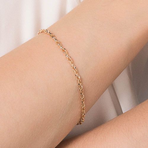 GOLD CROSSED LINK BRACELET