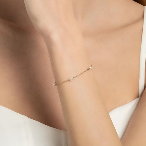 GOLD BRACELET WITH PEARLS